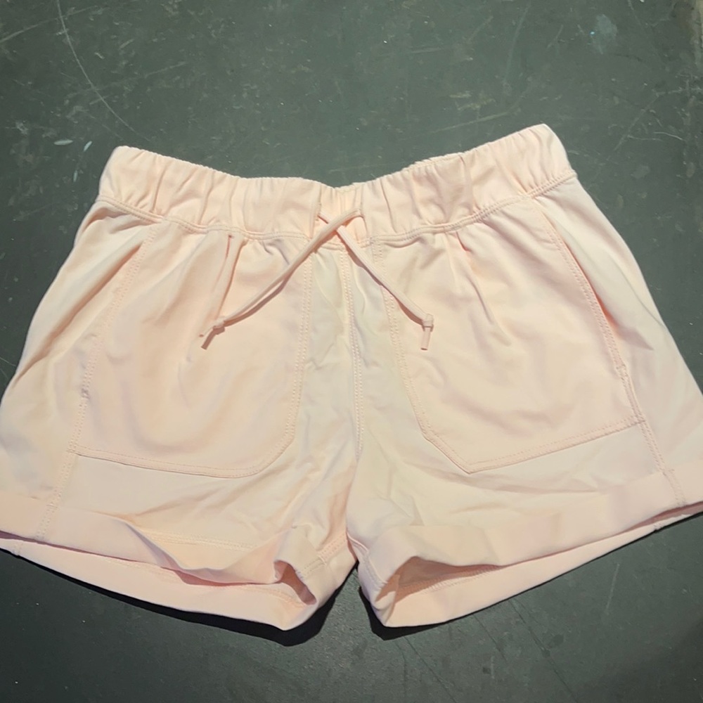 Girls Petal Pink Ivivva athletic shorts